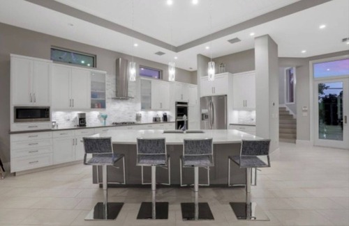 Bonita Shores House | Waterfront Luxury Estate - 5BR/6.5BA, Heated Pool, Spa, Tiki Hut & Gulf Access