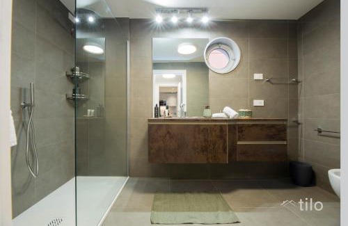 Genoa Apartment | Waterfront Luxury, 1BR, FREE Parking, AC, NETFLIX & WIFI By Tilo Lux