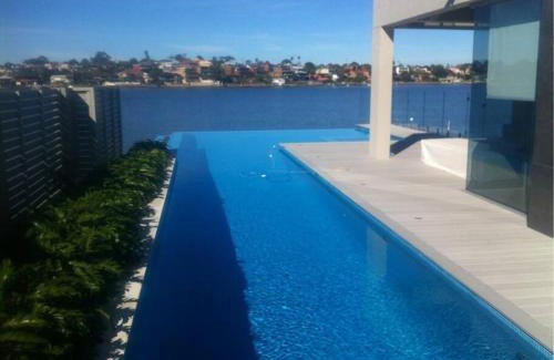 Kogarah Bay House | Waterfront Oasis , Infinity Pool, Sauna and steam room