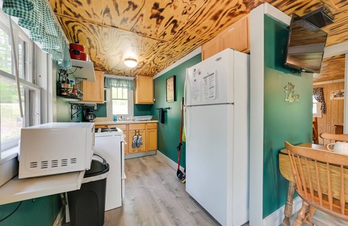 Carp Lake Cottage | Waterfront Paradise Lake Cottage w/Private Dock!