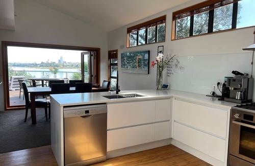 Bayswater House | Waterfront paradise with stunning views, spa pool, and paddle boarding.