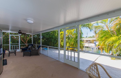 Marathon House | Waterfront & Privacy, Heated Pool HotTub & waterfall, 60' Dock TikiHut, pets ok