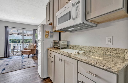North Shore Condo | Waterfront Striper’s Landing condo with views, pool & boat launch - near dining