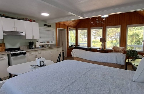 Lincoln City Cottage | Waterfront studio cottage...just steps to the sandy shoreline of the Siletz Bay