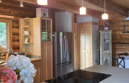 Kalispell House | Waterfront w/ Water Slide, Rock Climbing Wall & Ice Fishing Shanty in Winter