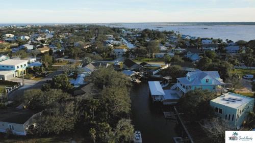 Butler Beach Villa | Waterfront Zen-Dock, Paddleboards, Jacuzzi & Games