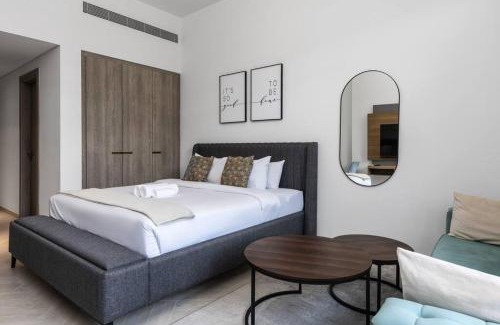 Jumeirah Village Circle Apartment | Waves - Elegant Oxford 212 Studio in JVC with City Views