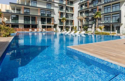 Jumeirah Village Circle Apartment | Waves - Elegant Oxford 212 Studio in JVC with City Views