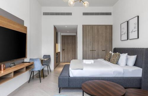 Jumeirah Village Circle Apartment | Waves - Elegant Oxford 212 Studio in JVC with City Views