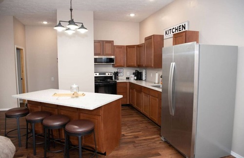 Mansfield Apartment | Weaver Loft: Cozy Downtown Retreat in the Heart of Mansfield - Home of Laura Ingalls Wilder!