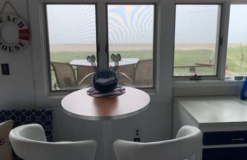 Buzzards Bay Condo | Welcome to Hideaway Retreat, a cozy get-a-way cottage with water views of Buttermilk Bay!