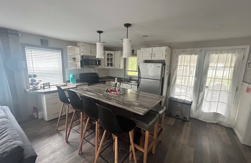 Pointe-du-Chene Cottage | Welcome to our modern cozy two bedroom cottage located in Pointe-du-Chene