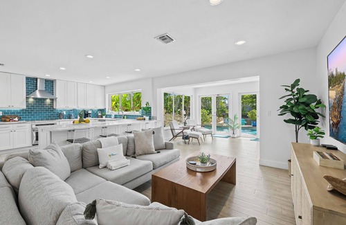 Coral Shores House | Welcome to Pineapple Paradise, A Spacious Modern Tropical Waterway Home!