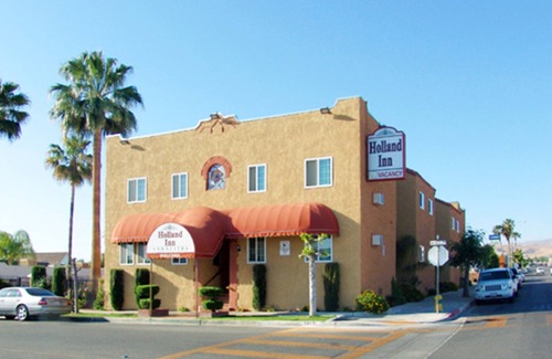 Taft House | Welcome to the Holland inn suites room with King Bed.