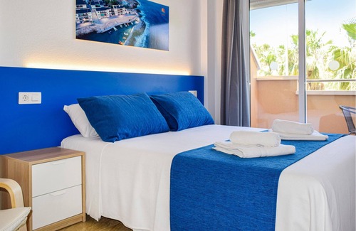 Los Puertos Apartment | Welcome to this lovely vacation apartment, just a few steps from the beach.