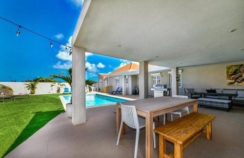 Oranjestad House | Welcome to your dream vacation escape in Aruba's tranquil Caya Luna neighborhood.