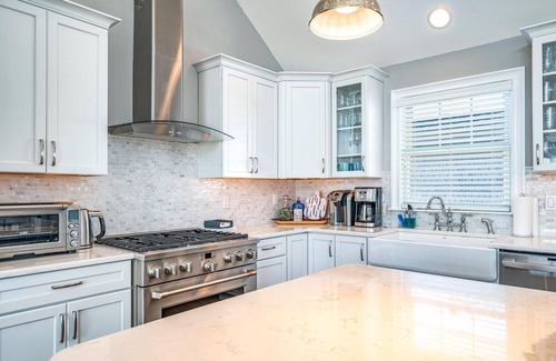 Avalon House | Welcome to your dream vacation home in the heart of Avalon! This stunning 7-bedroom home with POOL.