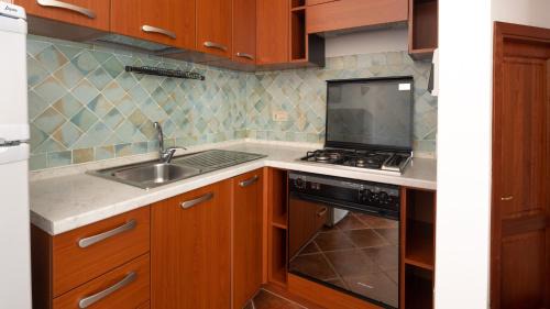 Case Peschiera-Lu Fraili Apartment | Welcomely - Mediterranea