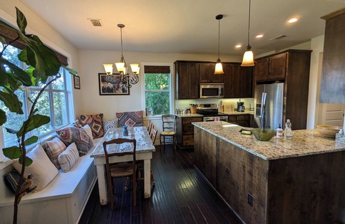 Leander House | Welcoming home overlooking lake with forested hill country views