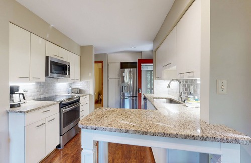 Gilford Condo | Well-appointed condo with beach access, pool, tennis court, & washer/dryer