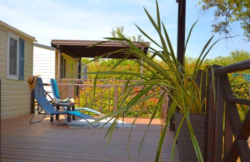 Lanterna Resort | West Coast Mobilhome with XXL Terrace in Naturist Resort Solaris FKK