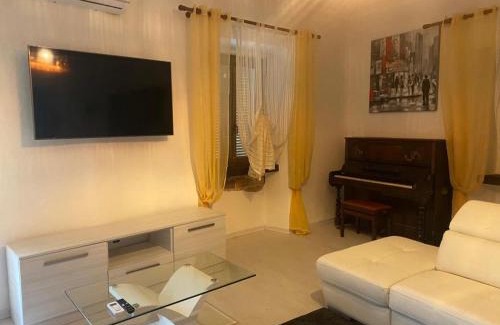 Bagnolo Piemonte Apartment | white appartament