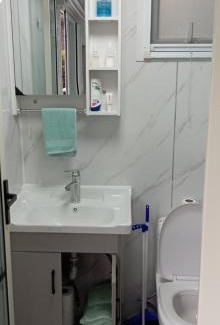 Tauranga Apartment | White cabin