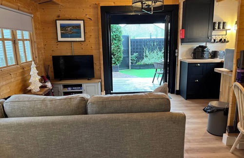 Chwilog Cabin | White River Retreats Log Cabin with Wood Fired Hot Tub