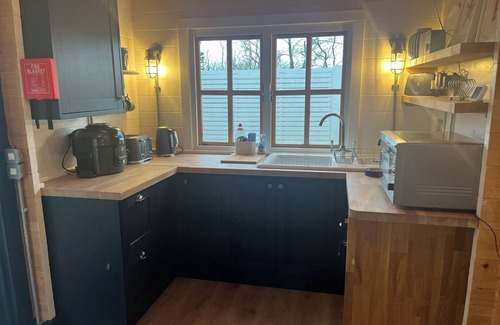 Chwilog Cabin | White River Retreats Log Cabin with Wood Fired Hot Tub