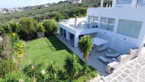 Heraklion Villa | WhiteBlue Spa Villa, By IdealStay Experience