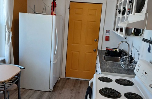 Winnipeg Apartment | Who likes red poang? Near downtown