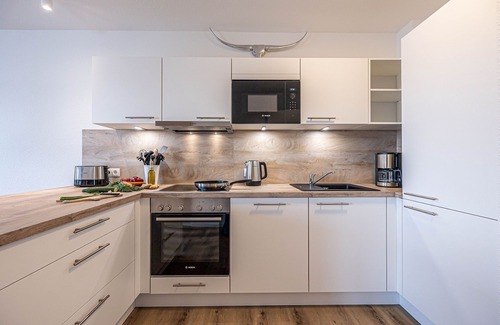 Schleswig Apartment | Wiking-koje 3 - Aufzug, 1. OG, Fußbodenheizung, Dusche, Waschmaschine, Balkon