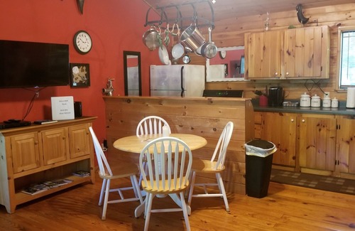 Franklin Cabin | Wild Bills Riverfront Escape - Garden hot tub