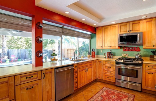 Windsor House | Wine Country Retreat. Large backyard with pool/spa, outdoor kitchen & fireplace