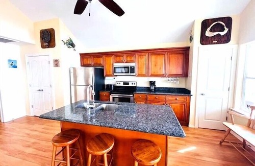 Grand Isle House | Wine Down- Coastal Realty Group