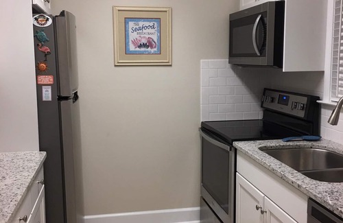 Holiday Isle Condo | Winter Mthly Rates Avail., FREE BEACH SETUP Mar-Oct,1st FLR, ON CANAL/HARBOR