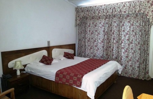 Mutare House | Wise Owl Motel