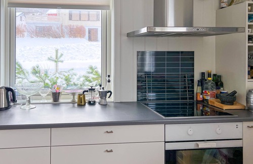 Halsa House | With a magnificent view of the Valsøyfjord, this cozy and family vacation home welcomes you.