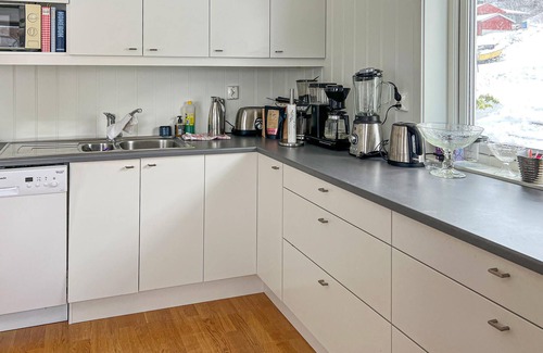 Halsa House | With a magnificent view of the Valsøyfjord, this cozy and family vacation home welcomes you.