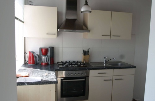 Schoondijke House | Wonderful private villa for 4 guests with WIFI, TV, terrace and pets allowed