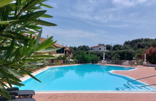 Pantai House | Wonderful villa for 6 guests with pool, WIFI, TV and terrace