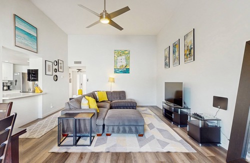 The Lakes Condo | Wonderful waterfront condo with pool, private balcony & fast WiFi - dog-friendly