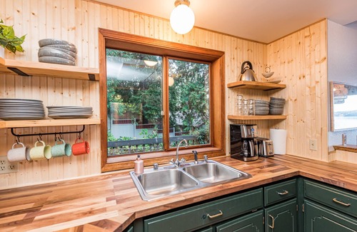 Adelma Beach Cabin | Woodsy Waterfront: Hot Tub, Sauna, Movie Theater & Fireplace!