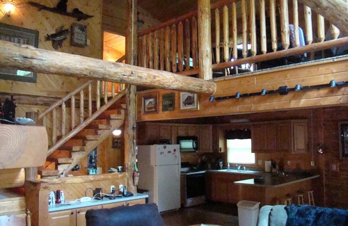 Pickerel Cabin | Year-round cabin, wooded riverfront on Lily River, WiFi, Central A/C, ATV Trails