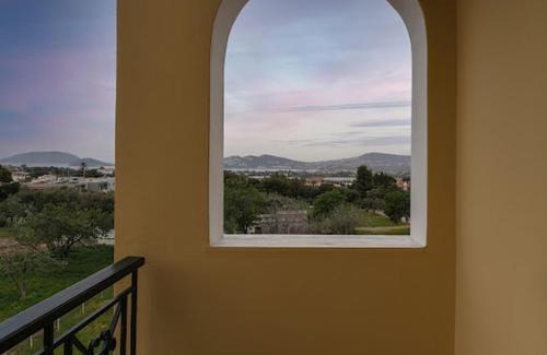 Palaia Fokaia Apartment | Yellow house