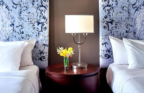 West Plaza Hotel | Your Home Far Away From Home! 2 Relaxing Units, Onsite Pool, Pets Allowed!
