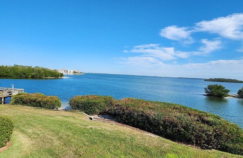 Tierra Verde Condo | Your Waterfront Piece of Paradise Awaits! Enjoy a gorgeous water view sunrise