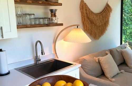 Estero House | Zen Container Tiny Home with Yard, Fire Pit & Pet Friendly, FGCU, Restaurants