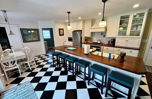 1 mile from Torch Lake - The Farmhouse, remodeled getaway on 10 acres