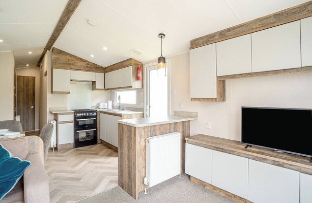 12ft-wide luxury caravan with one double and two twin.